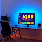 IQ88 online betting interface displayed on a modern desktop in a cozy home office setting.